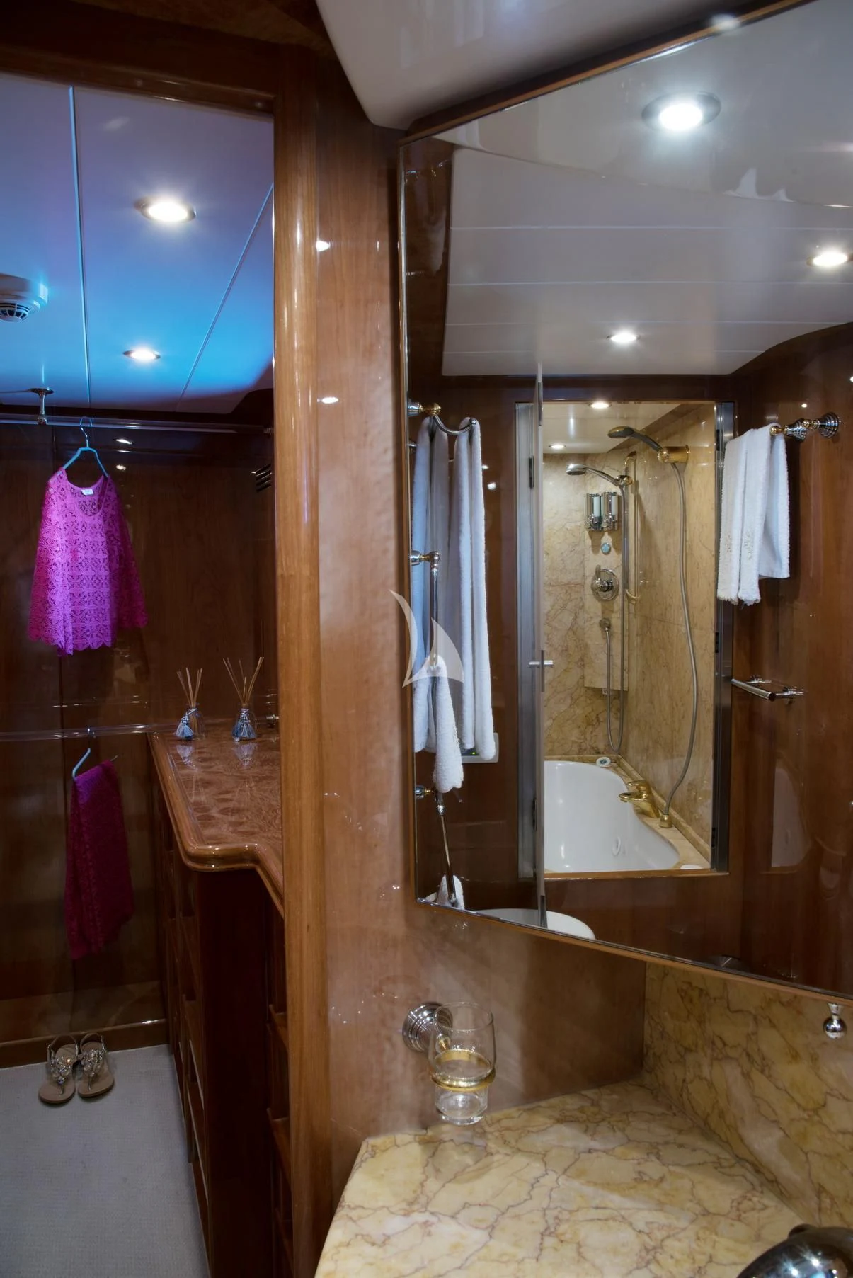 a bathroom with a large mirror aboard D'ARISTOTELIS Yacht for Sale