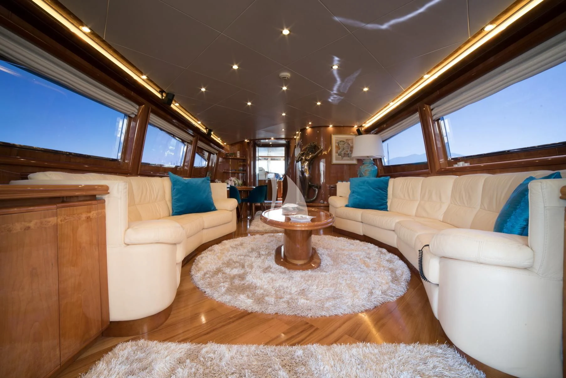 a living room with a couch and a table aboard D'ARISTOTELIS Yacht for Sale