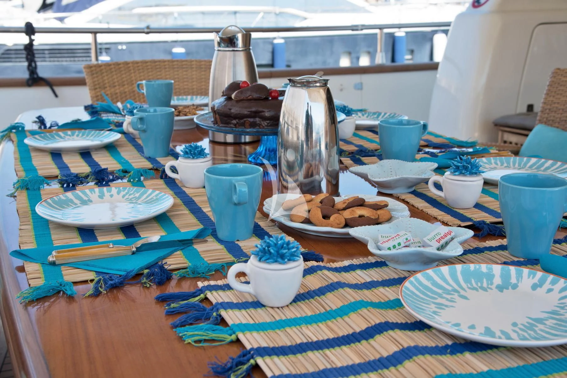 a table with plates and cups aboard D'ARISTOTELIS Yacht for Sale