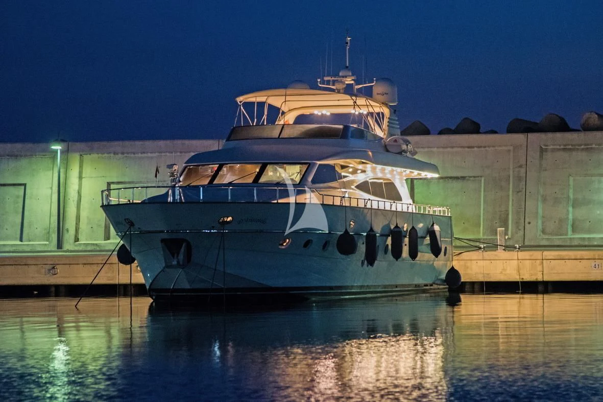a boat docked at night aboard D'ARISTOTELIS Yacht for Sale
