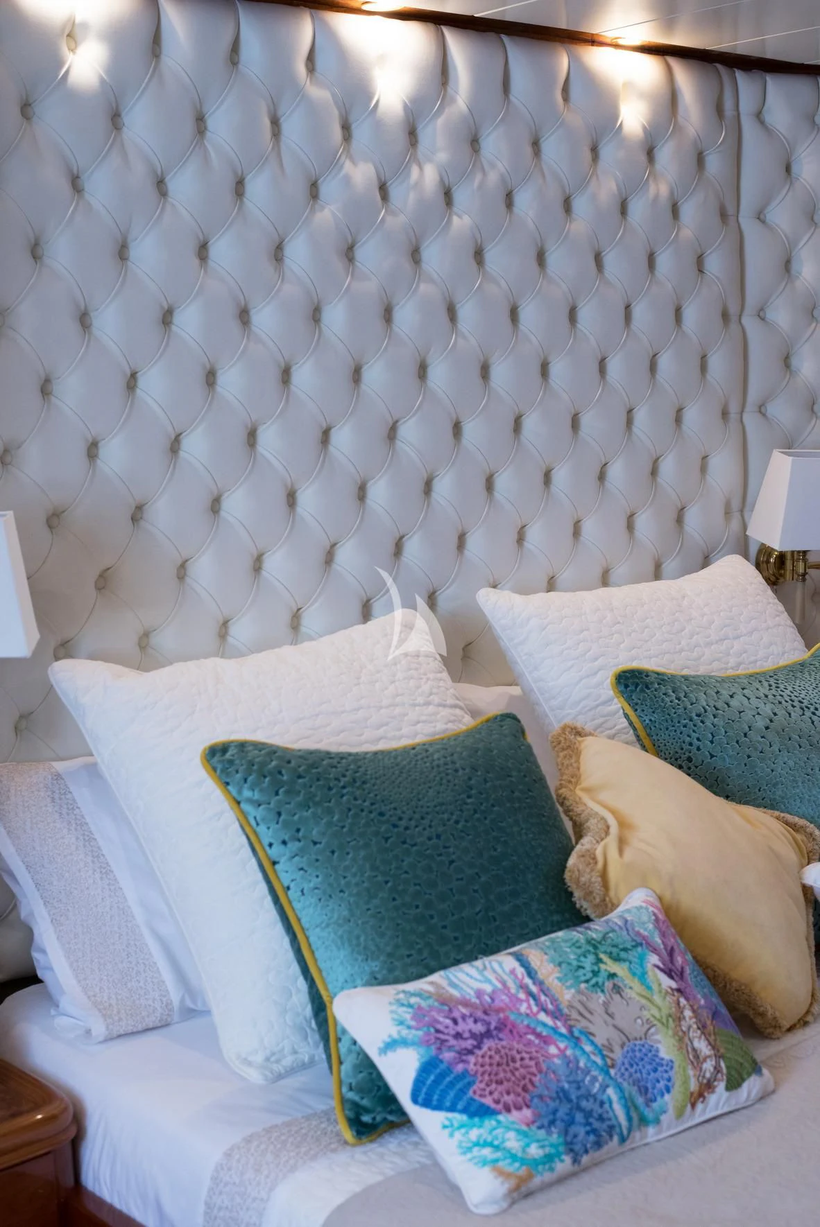a bed with pillows aboard D'ARISTOTELIS Yacht for Sale