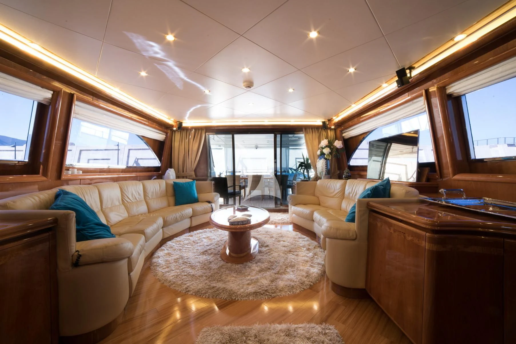a living room with a large window aboard D'ARISTOTELIS Yacht for Sale