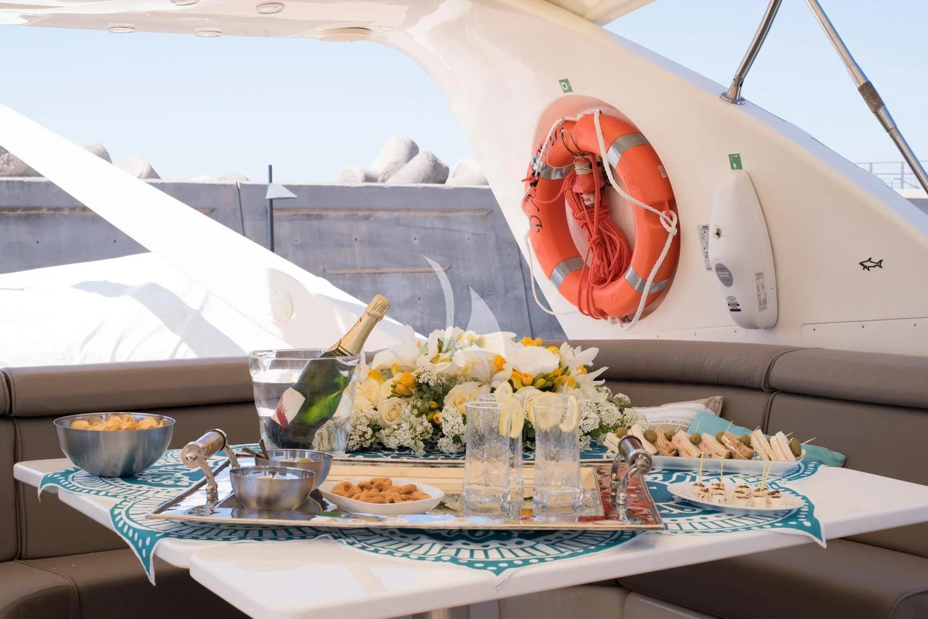 a table with food and a painting aboard D'ARISTOTELIS Yacht for Sale