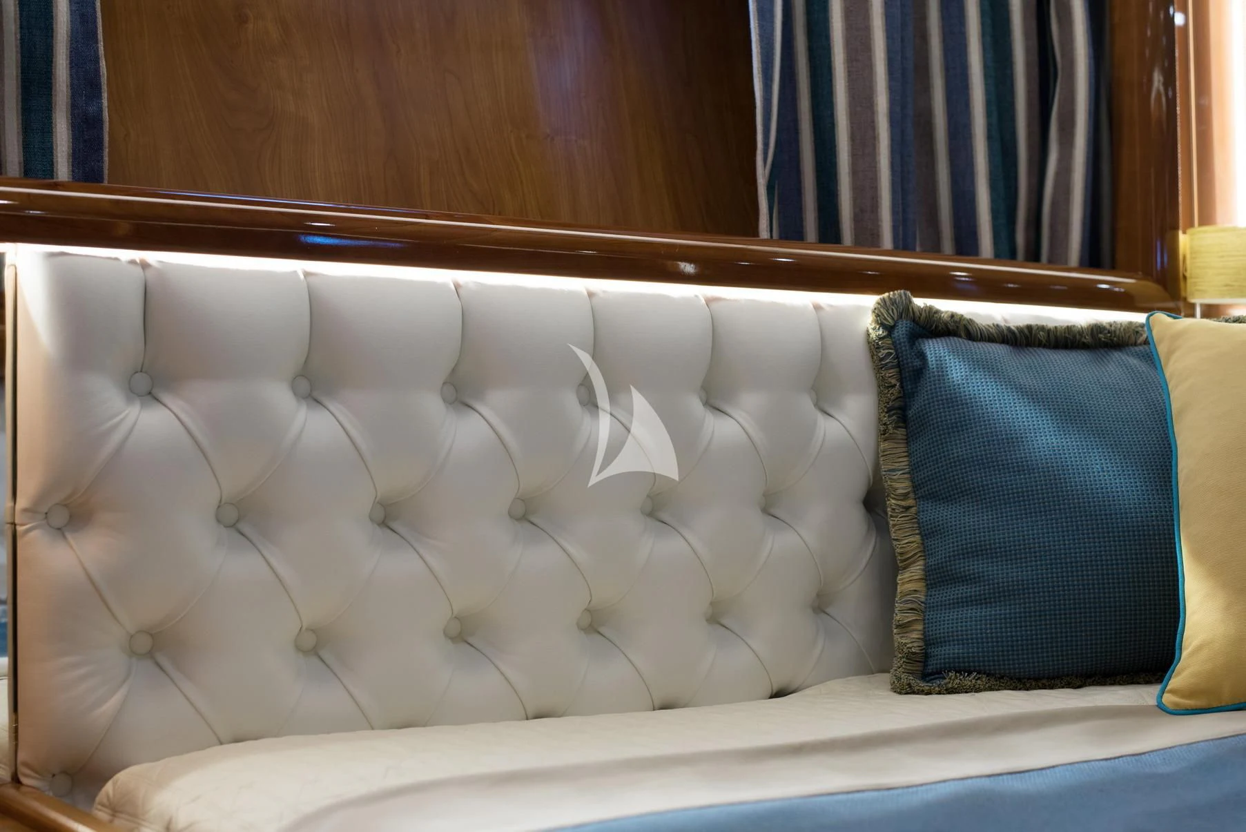 a bed with white sheets aboard D'ARISTOTELIS Yacht for Sale