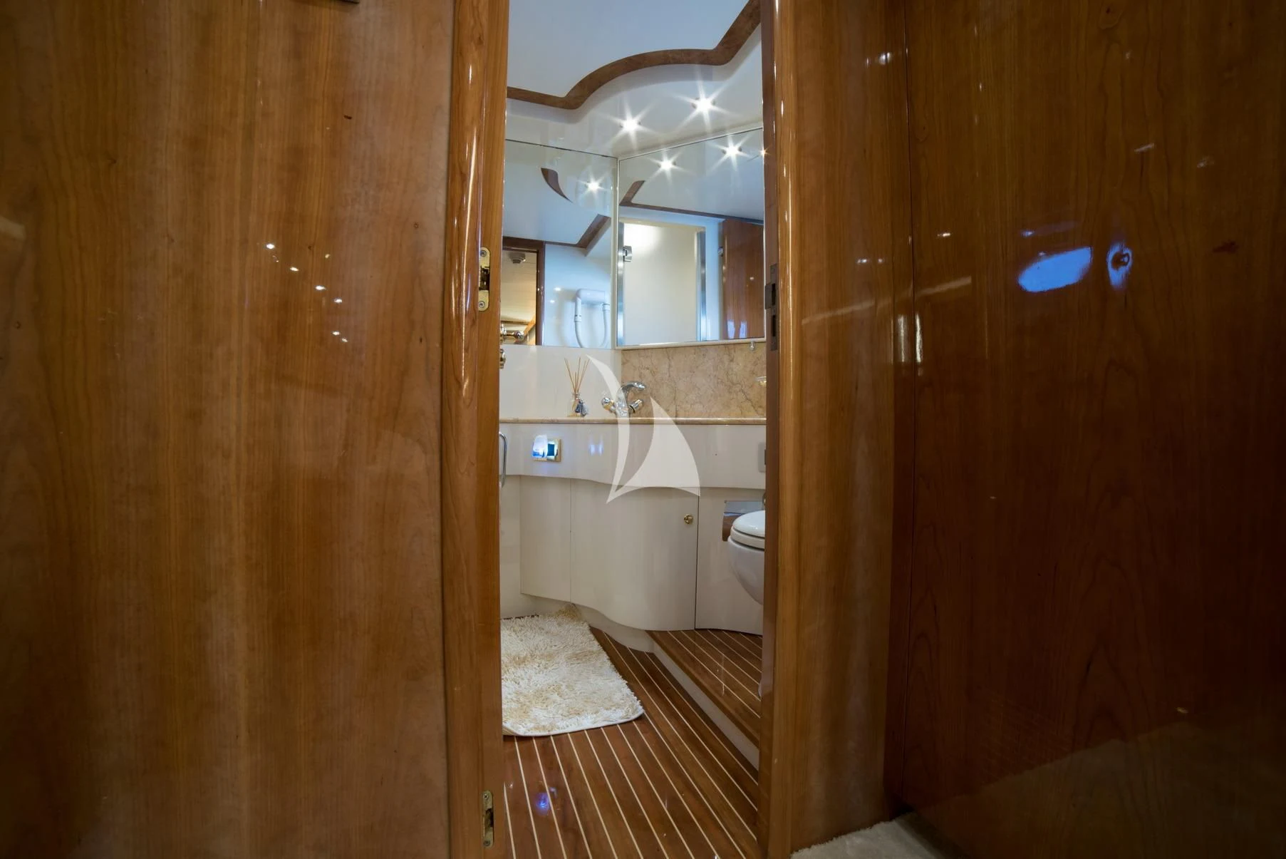 a bathroom with a large mirror aboard D'ARISTOTELIS Yacht for Sale