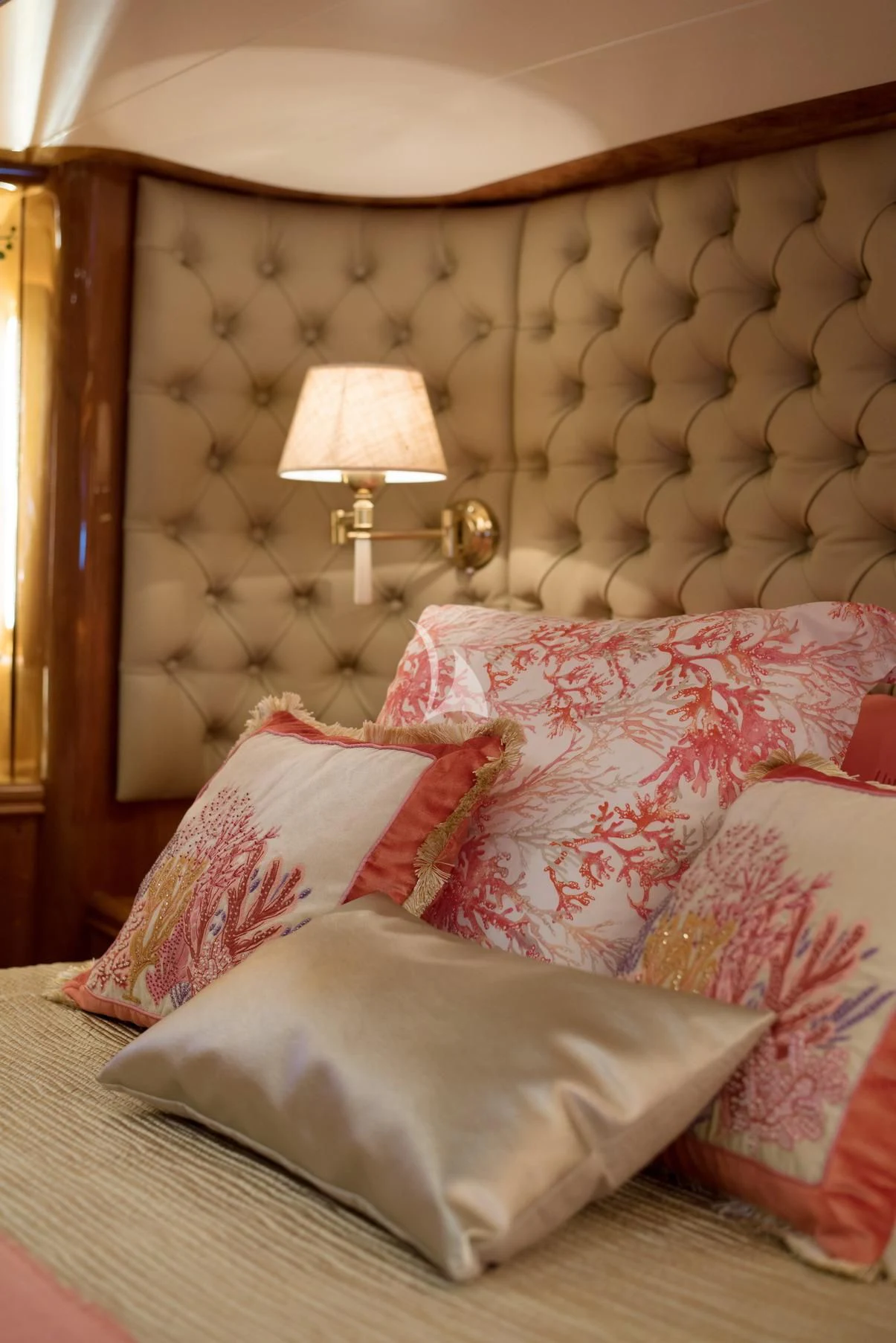 a bed with a lamp on it aboard D'ARISTOTELIS Yacht for Sale
