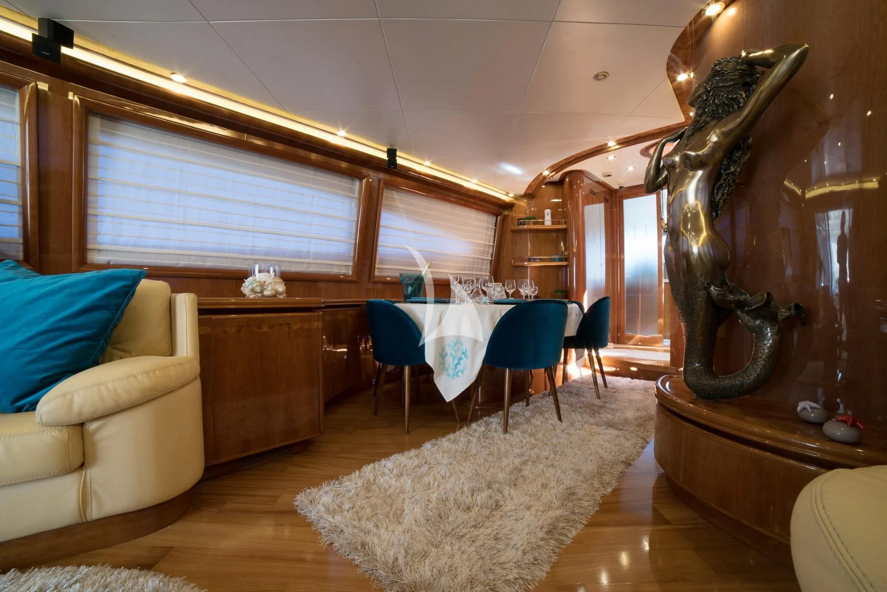 a room with a table and chairs aboard D'ARISTOTELIS Yacht for Sale