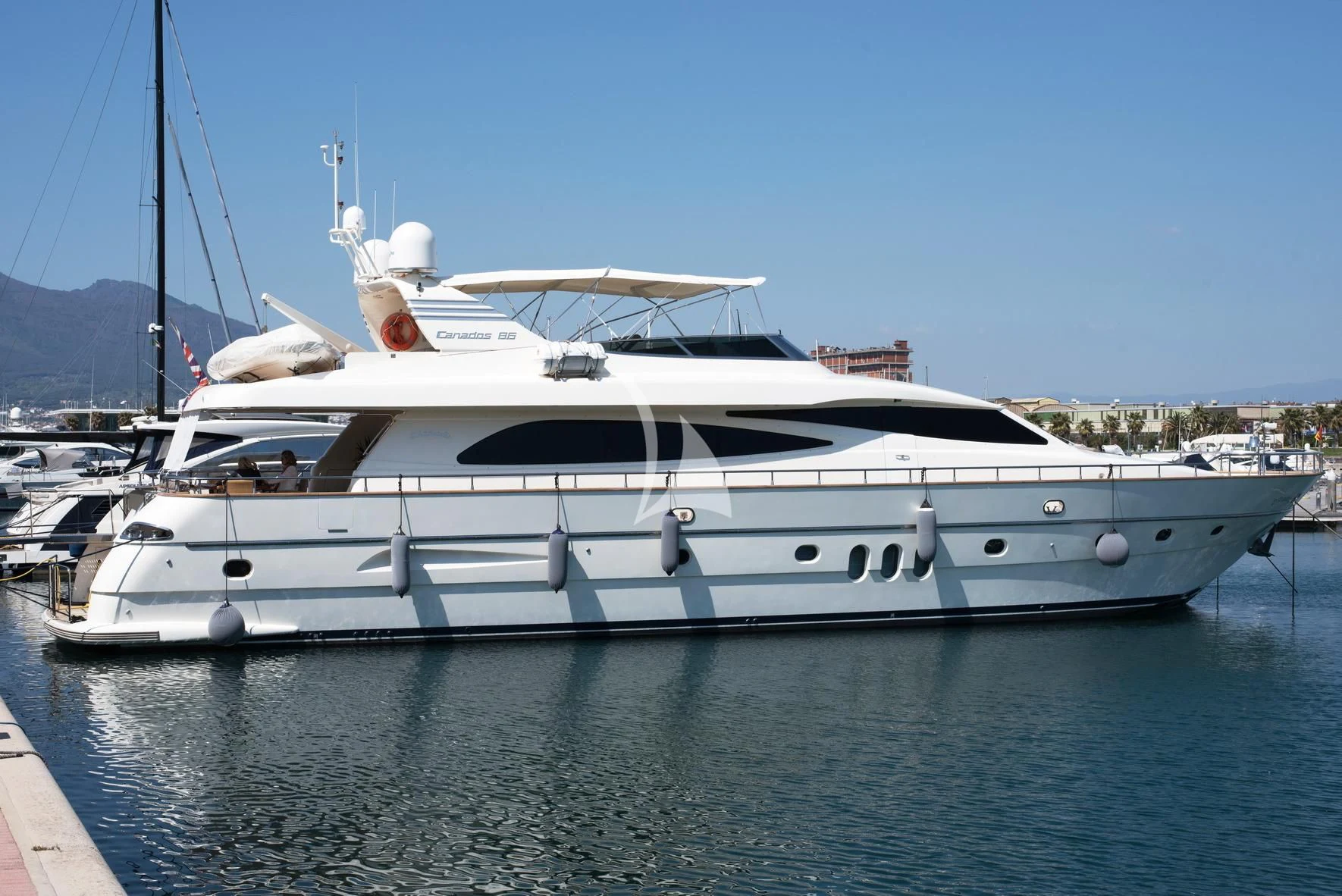 a white yacht on the water aboard D'ARISTOTELIS Yacht for Sale