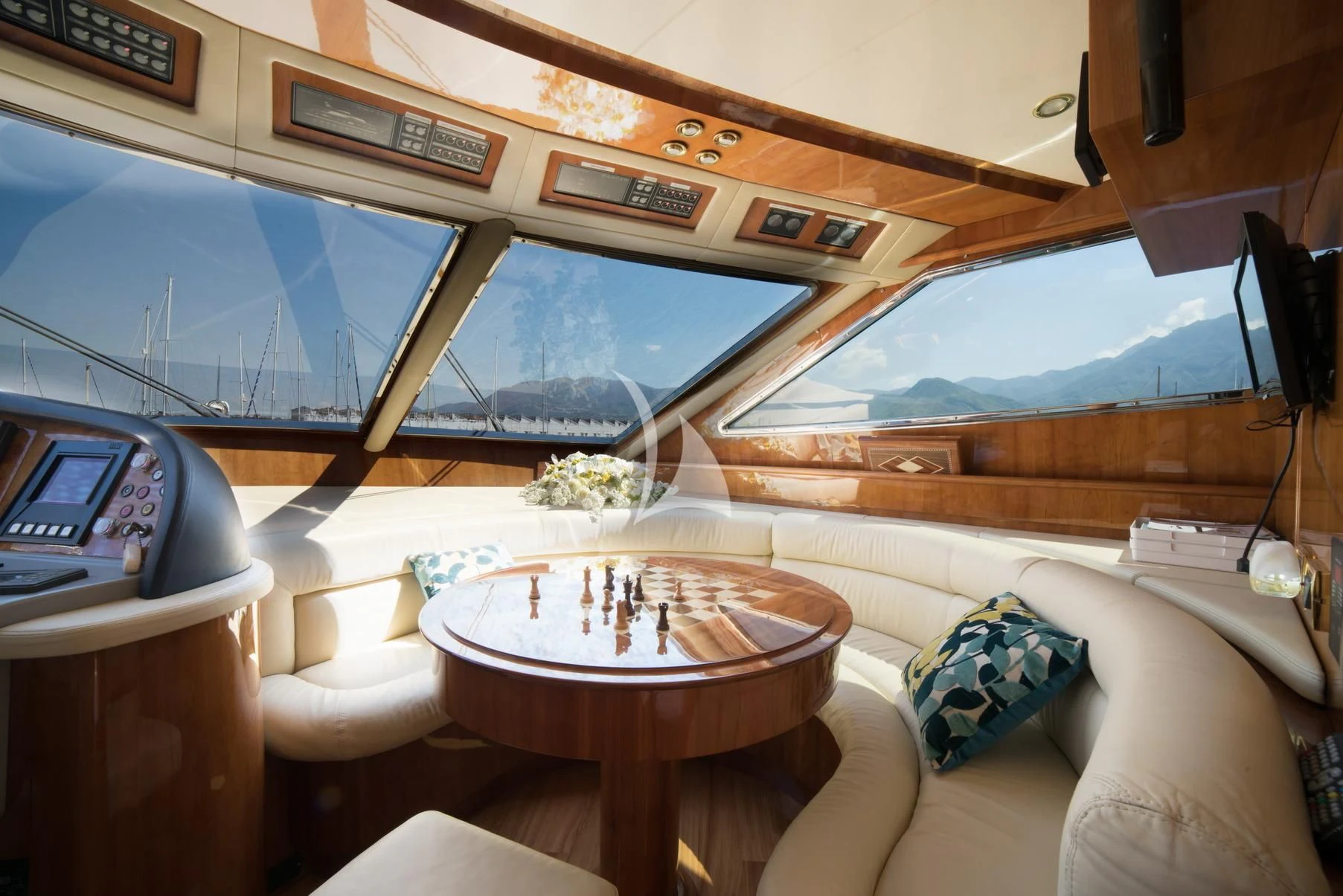 a room with a table and chairs aboard D'ARISTOTELIS Yacht for Sale