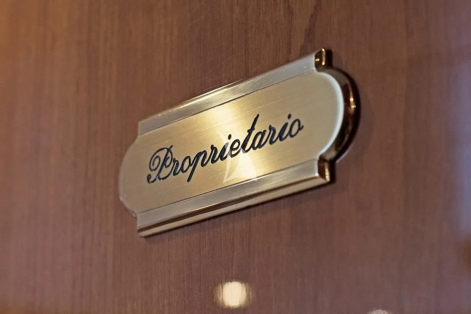 a metal rectangular object with a name on it aboard D'ARISTOTELIS Yacht for Sale