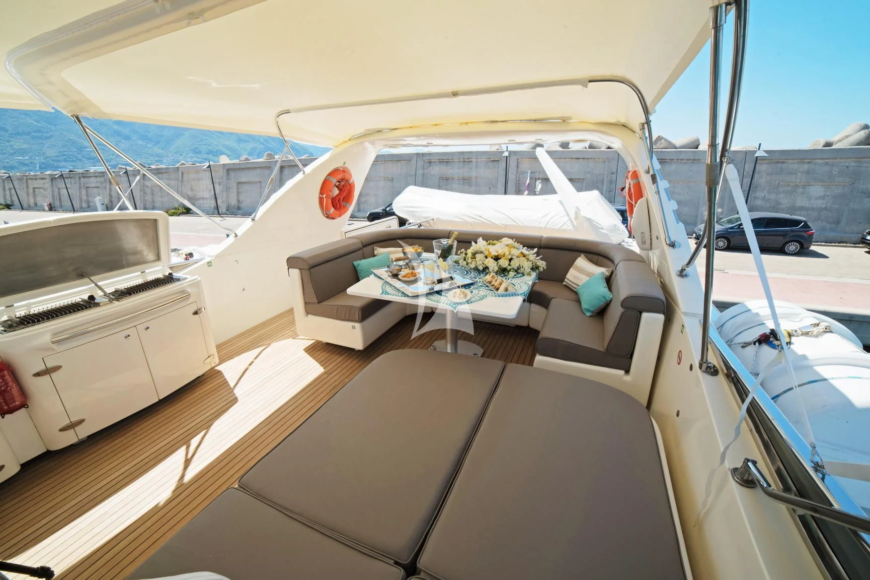 a boat with a table and a tray on it aboard D'ARISTOTELIS Yacht for Sale