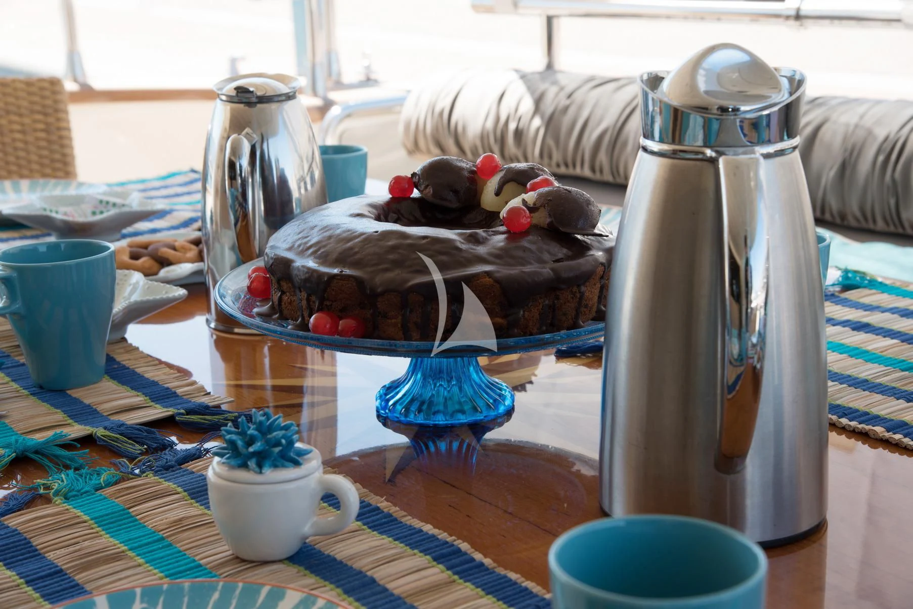 a cake on a plate aboard D'ARISTOTELIS Yacht for Sale
