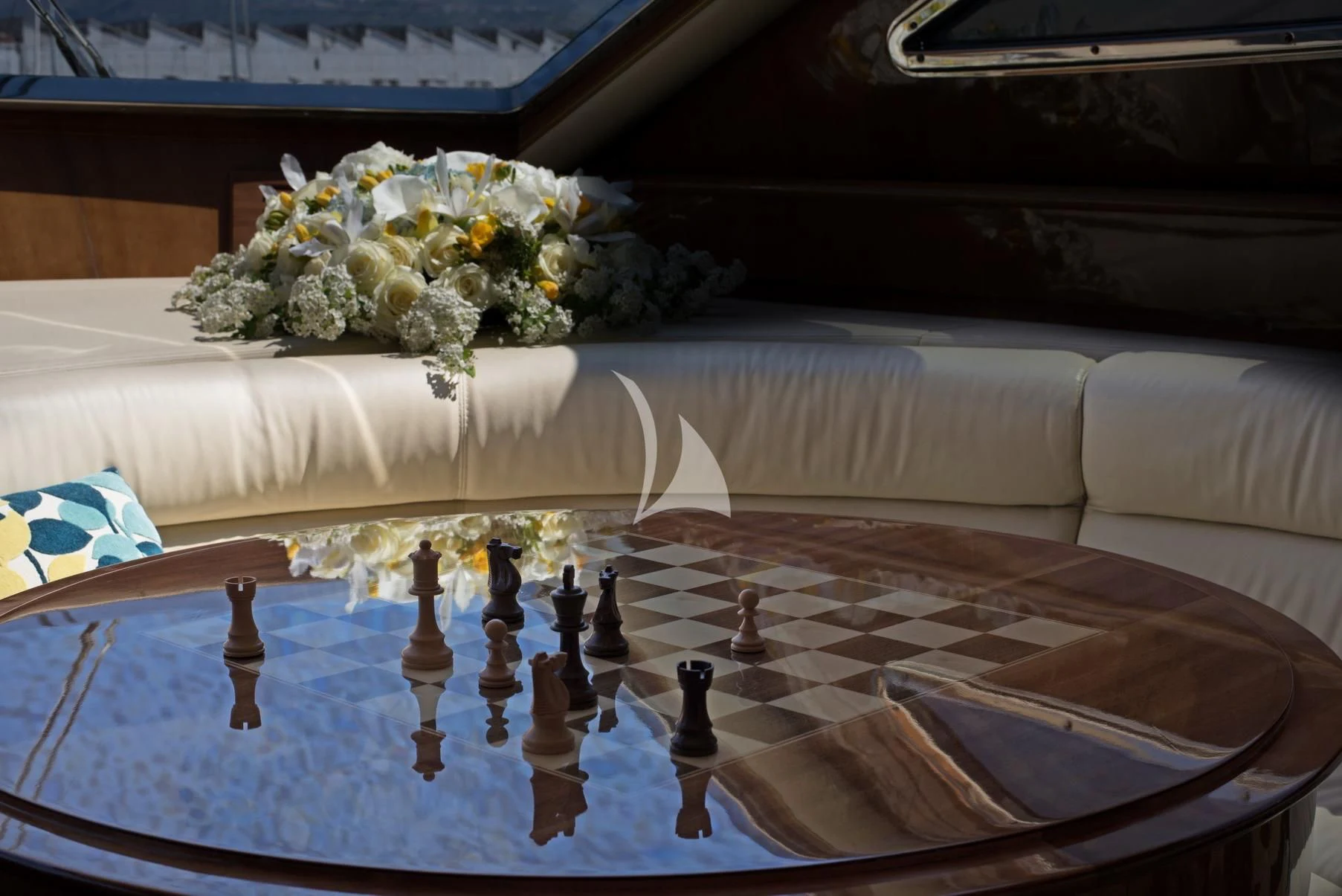 a table with flowers on it aboard D'ARISTOTELIS Yacht for Sale