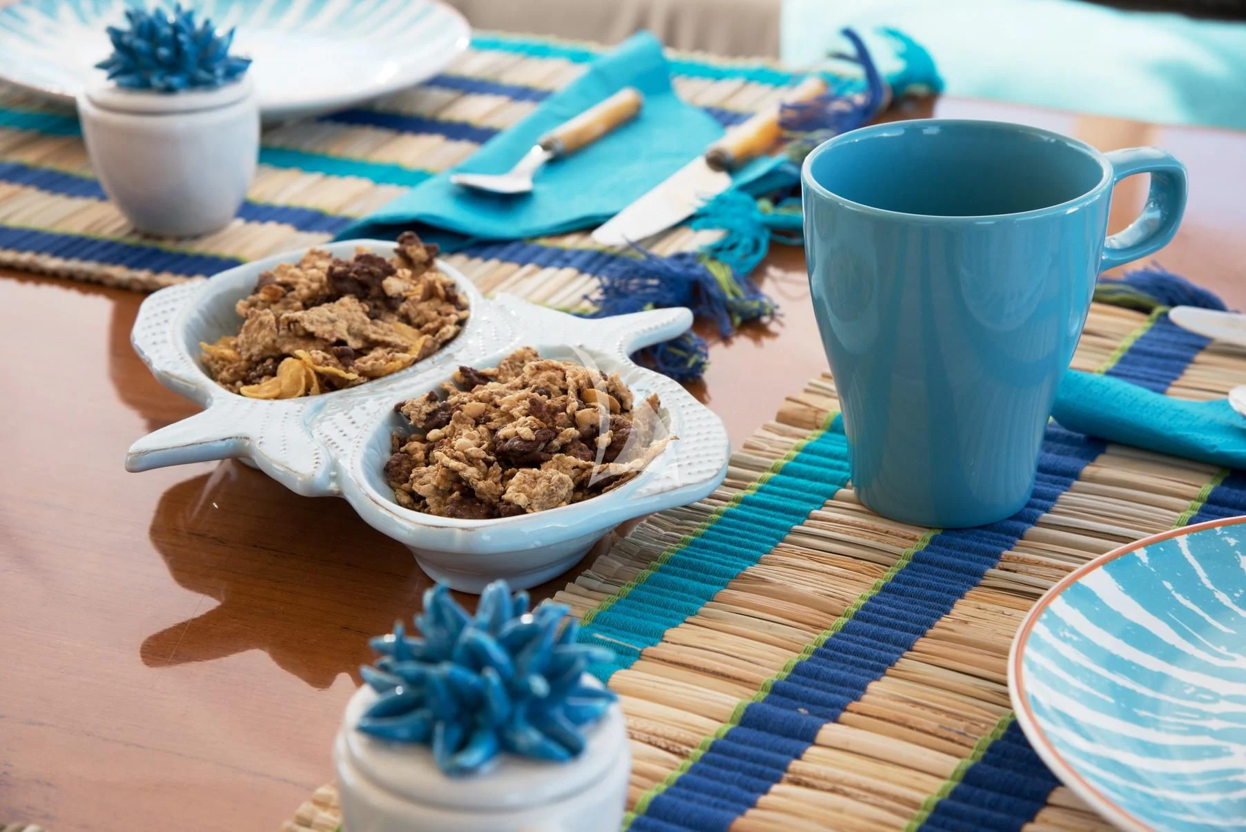 a table with plates and bowls of food on it aboard D'ARISTOTELIS Yacht for Sale