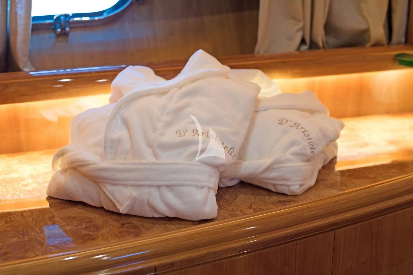 a pair of white gloves on a table aboard D'ARISTOTELIS Yacht for Sale
