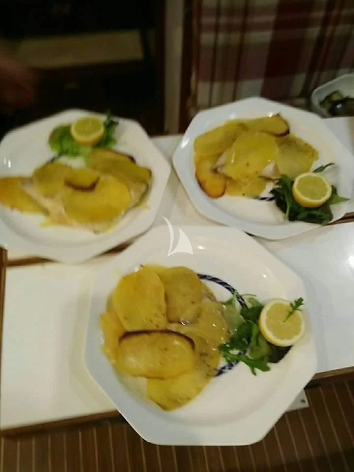 a plate of food aboard D'ARISTOTELIS Yacht for Sale