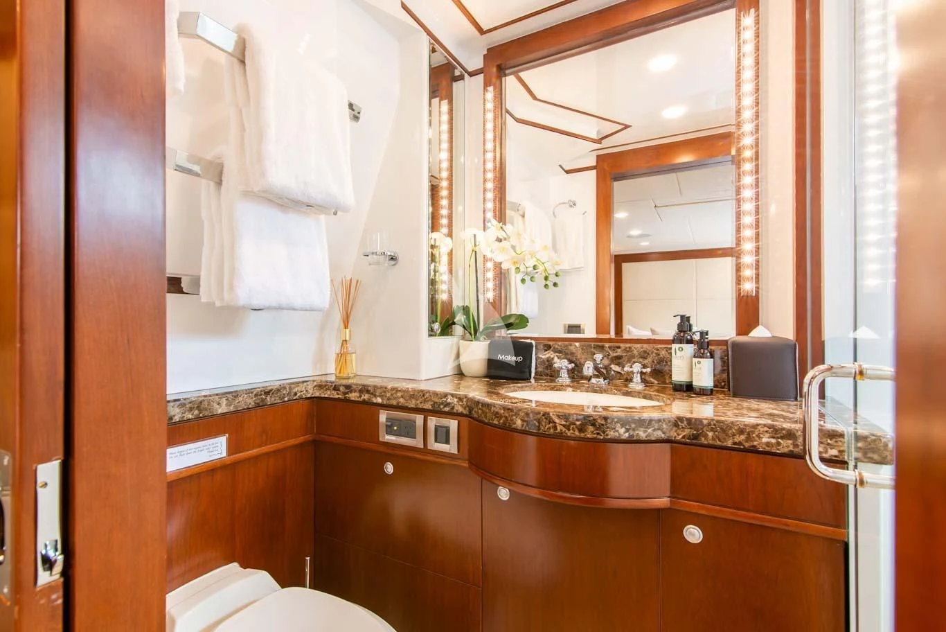 a bathroom with a sink and mirror aboard MASTEKA 2 Yacht for Charter