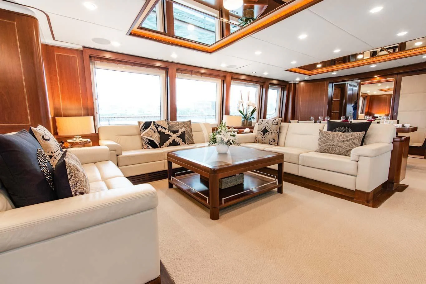 a living room with a couch and a coffee table aboard MASTEKA 2 Yacht for Charter