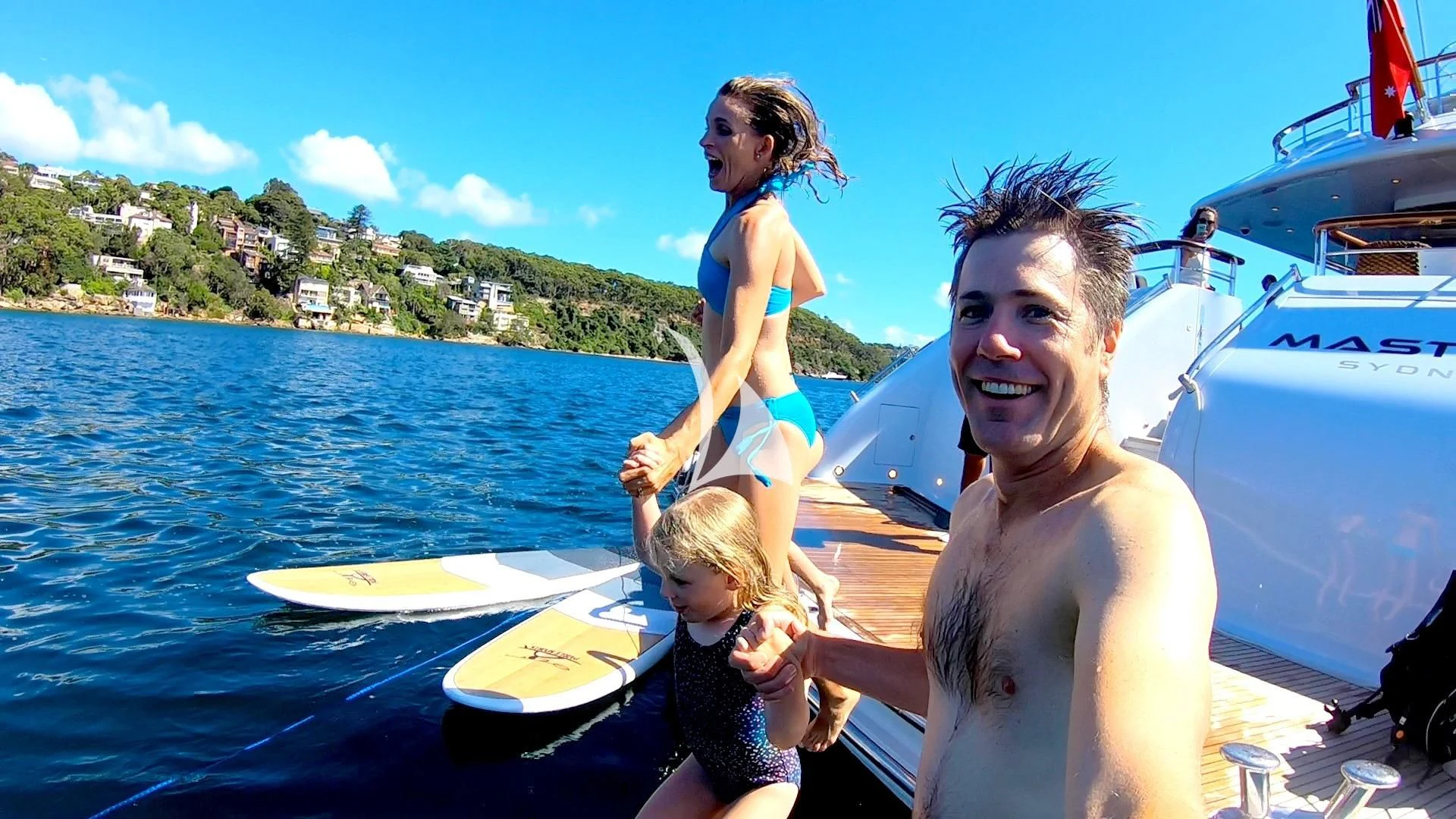a man and woman with kids on a boat aboard MASTEKA 2 Yacht for Charter