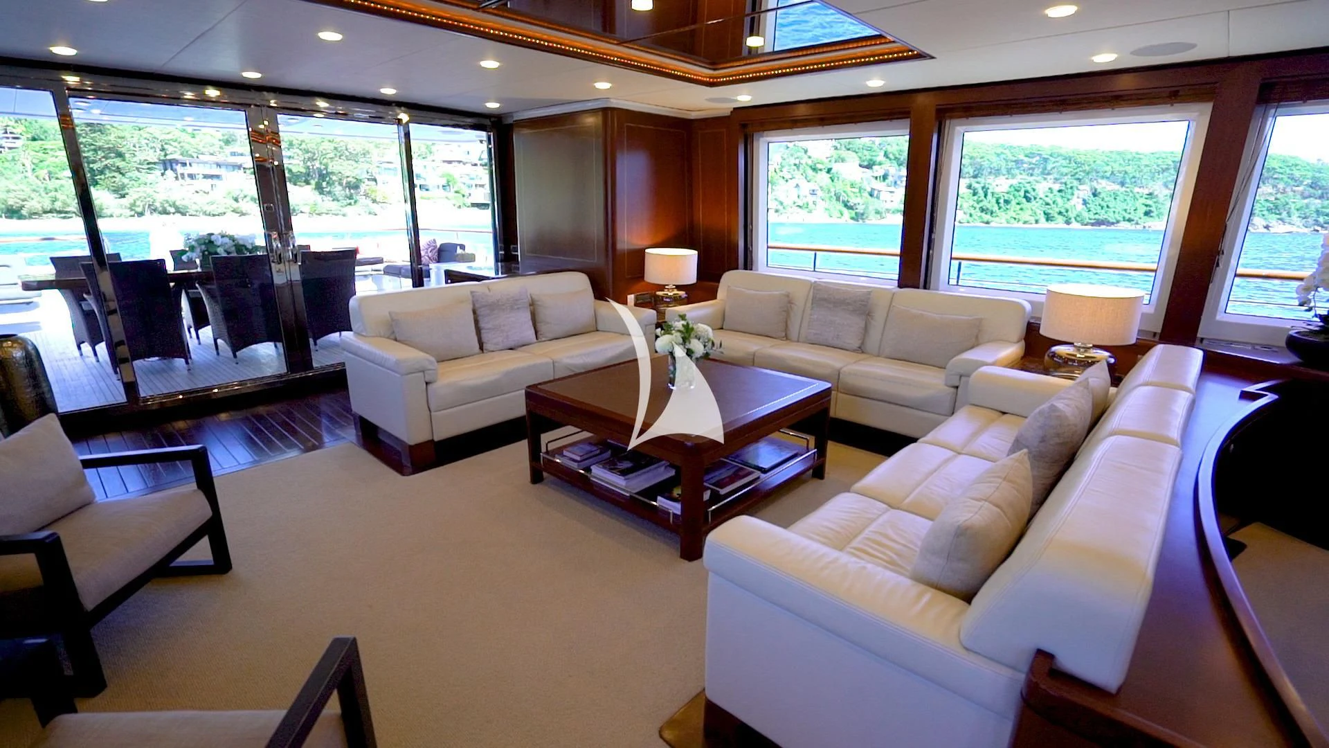 a living room with a large window aboard MASTEKA 2 Yacht for Charter