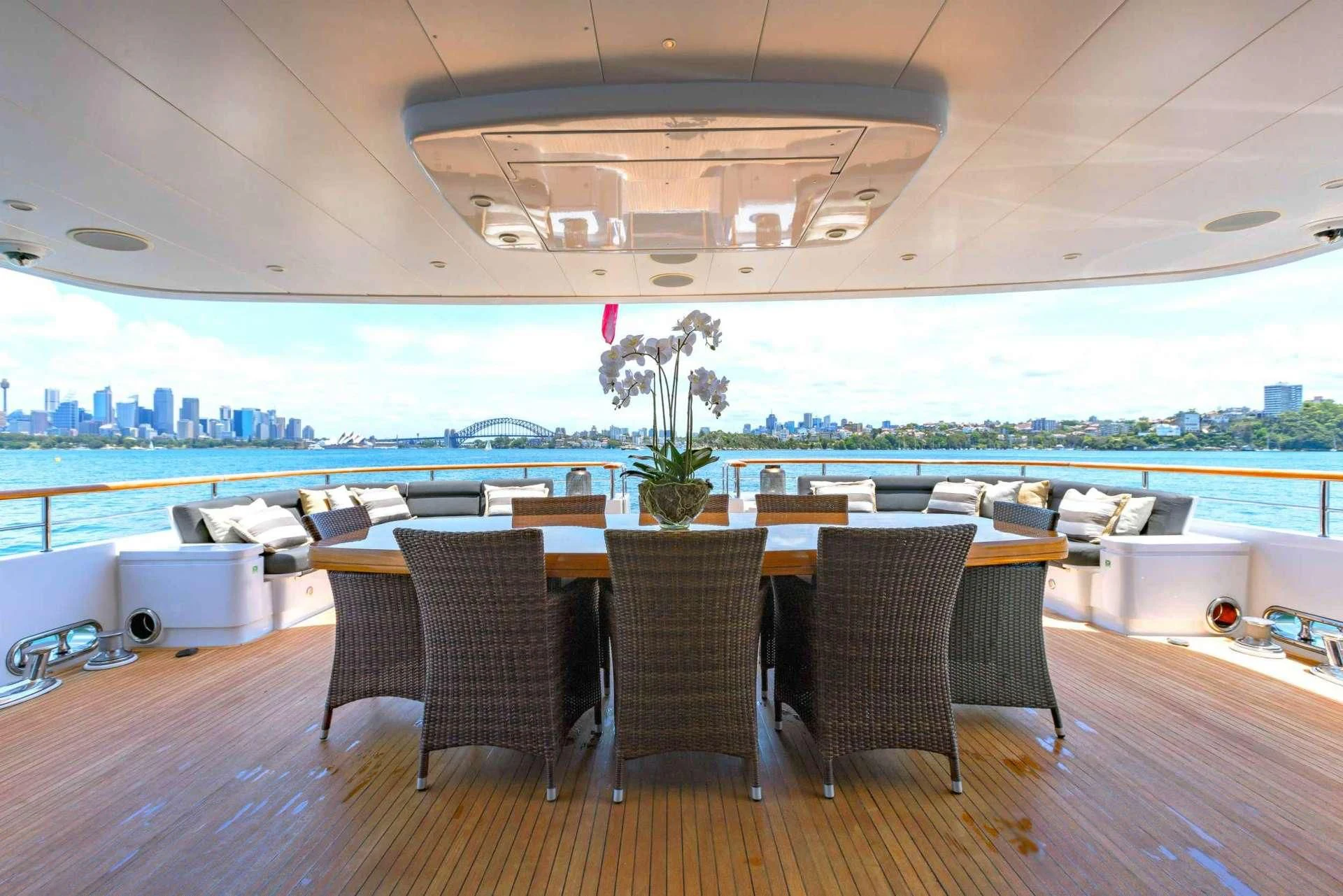 a room with tables and chairs aboard MASTEKA 2 Yacht for Charter