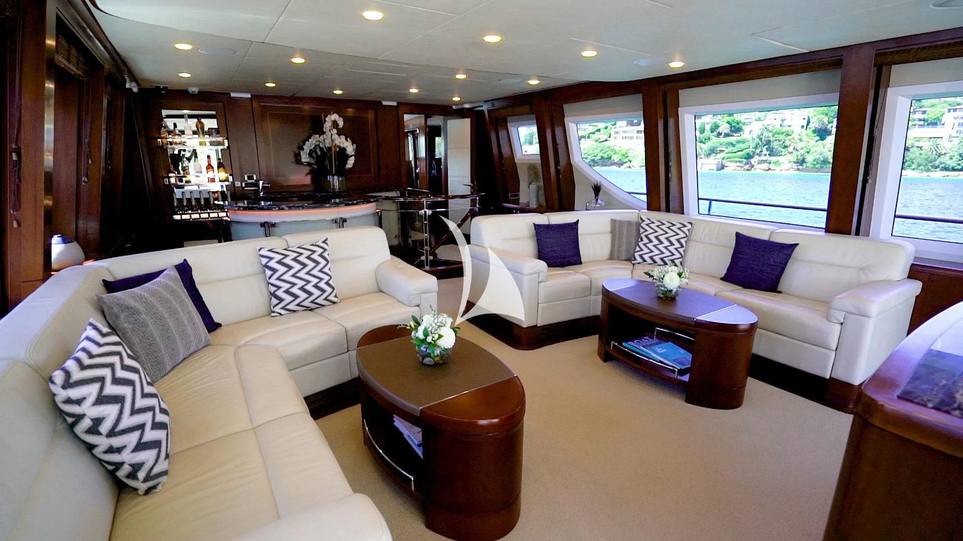 a living room with a couch and a coffee table aboard MASTEKA 2 Yacht for Charter