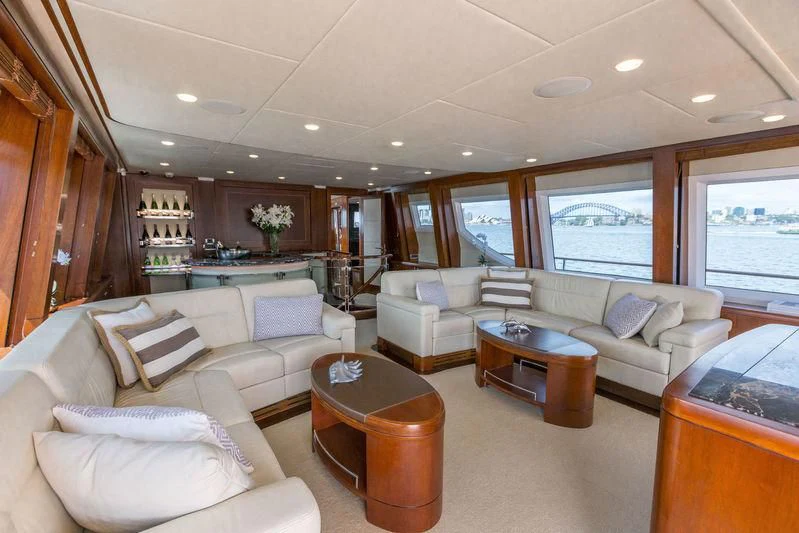 a living room with a large window aboard MASTEKA 2 Yacht for Charter