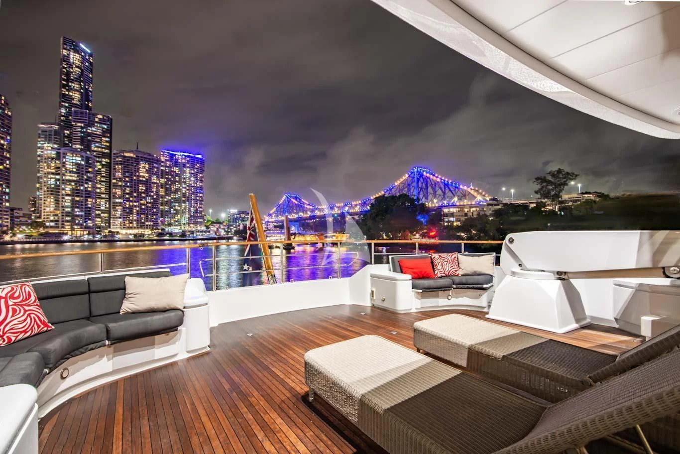 a room with a view of a city at night aboard MASTEKA 2 Yacht for Charter