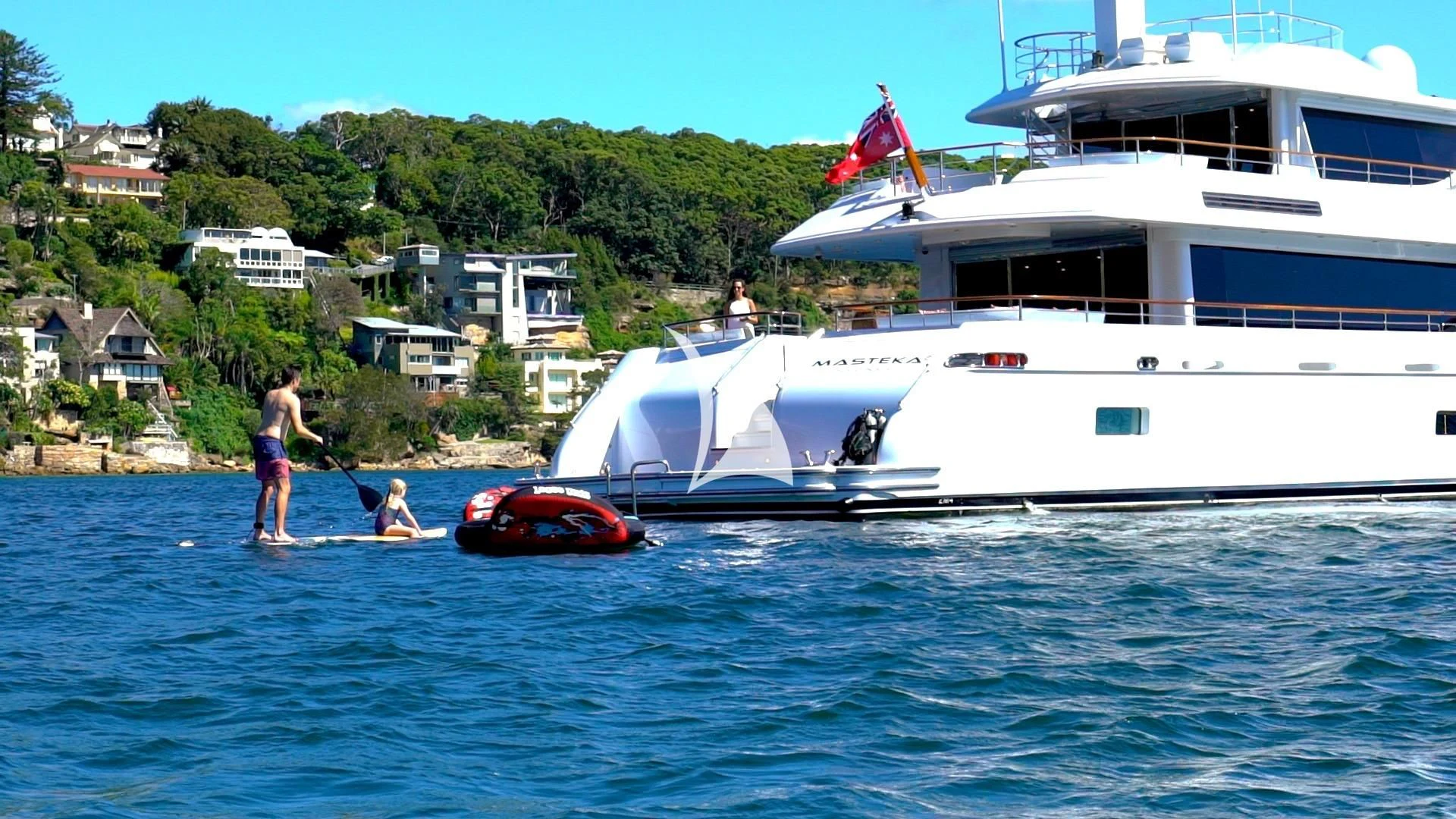 a boat and a couple of people on the water aboard MASTEKA 2 Yacht for Charter