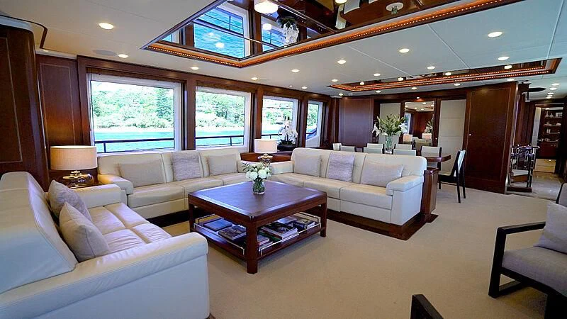 a living room with a table and couches aboard MASTEKA 2 Yacht for Charter