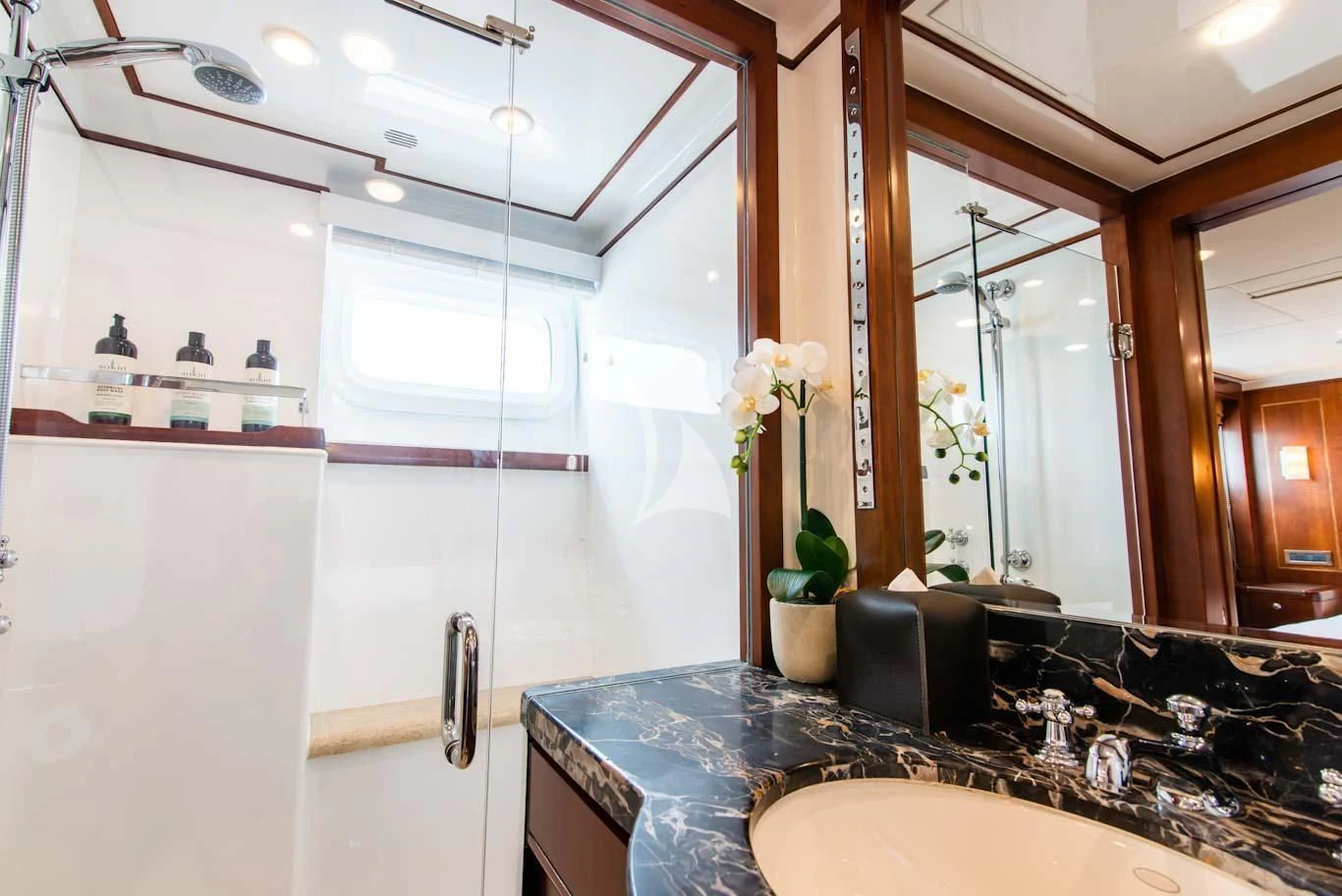 a bathroom with a large mirror aboard MASTEKA 2 Yacht for Charter