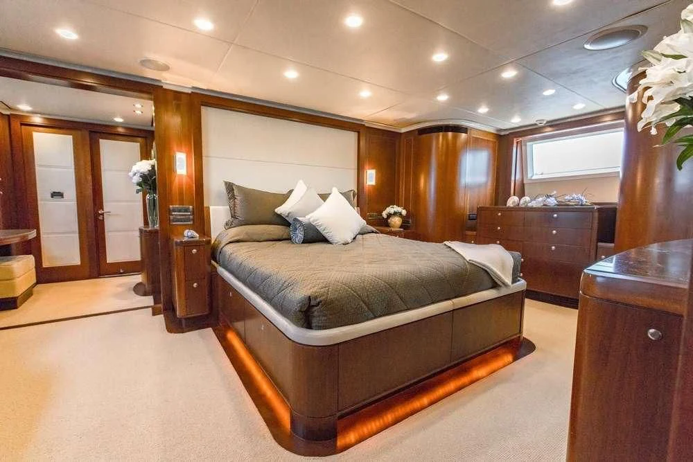 a large bedroom with a large bed aboard MASTEKA 2 Yacht for Charter