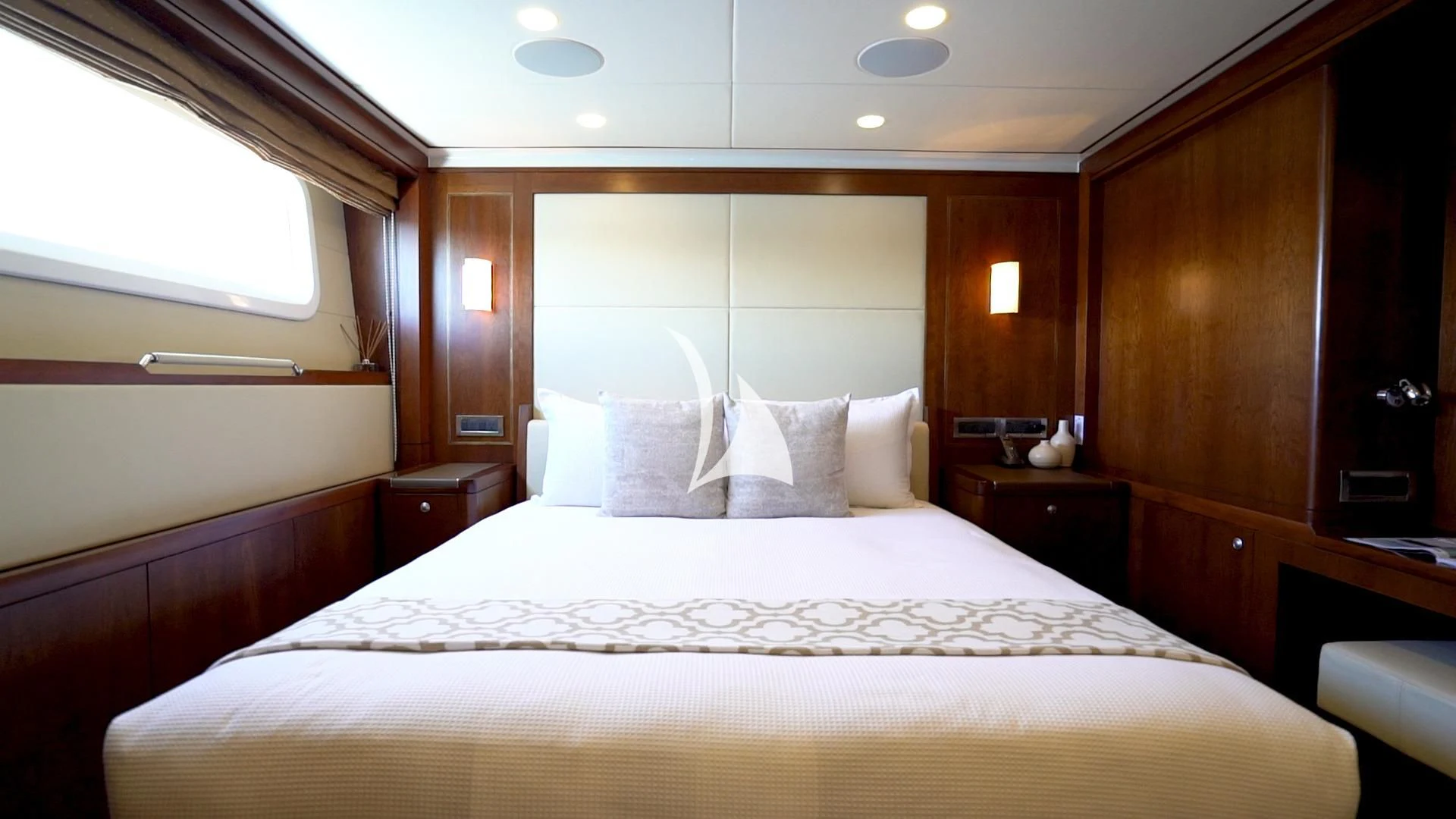 a bed with white sheets aboard MASTEKA 2 Yacht for Charter