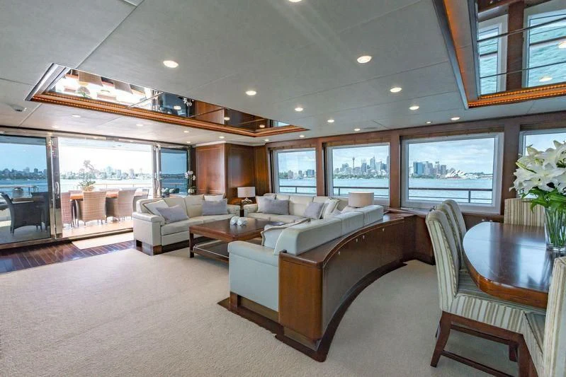 a living room with a large window aboard MASTEKA 2 Yacht for Charter