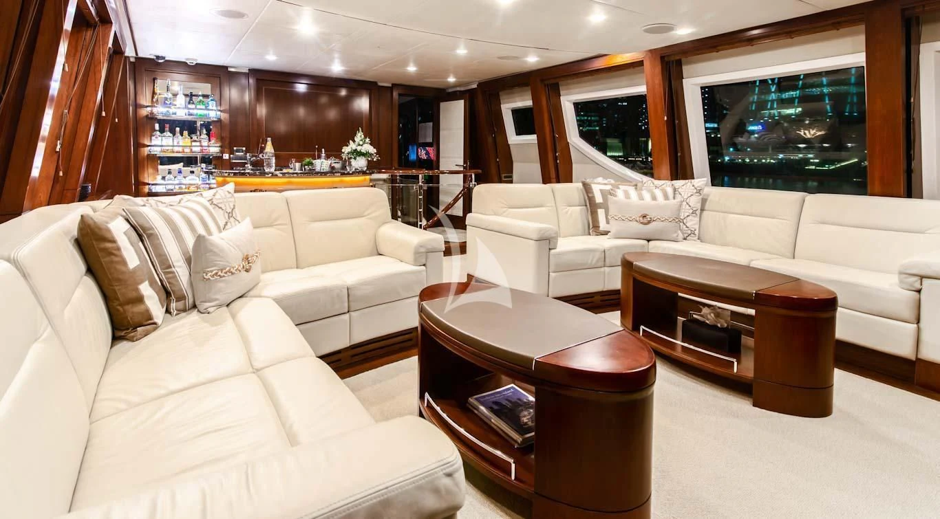 a living room with a couch and a coffee table aboard MASTEKA 2 Yacht for Charter