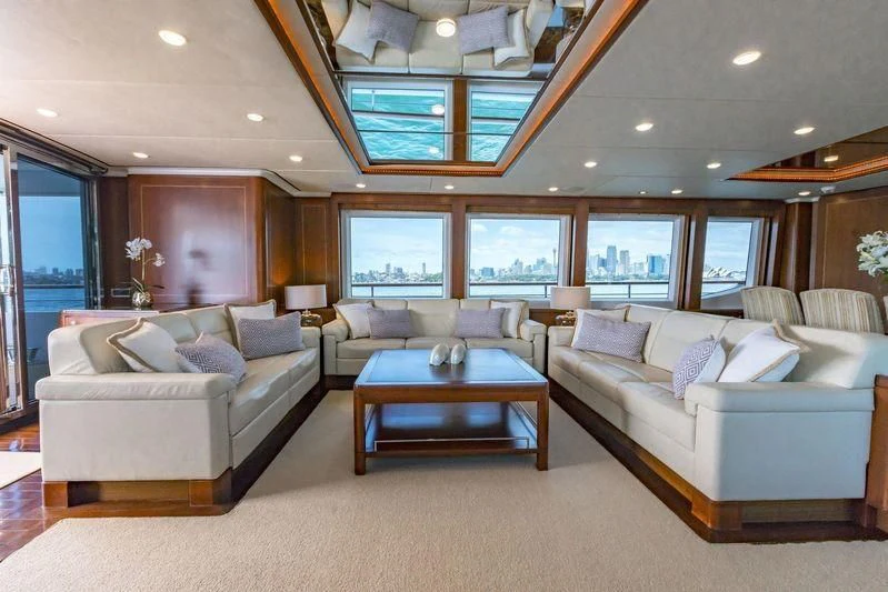 a living room with a couch and a coffee table aboard MASTEKA 2 Yacht for Charter
