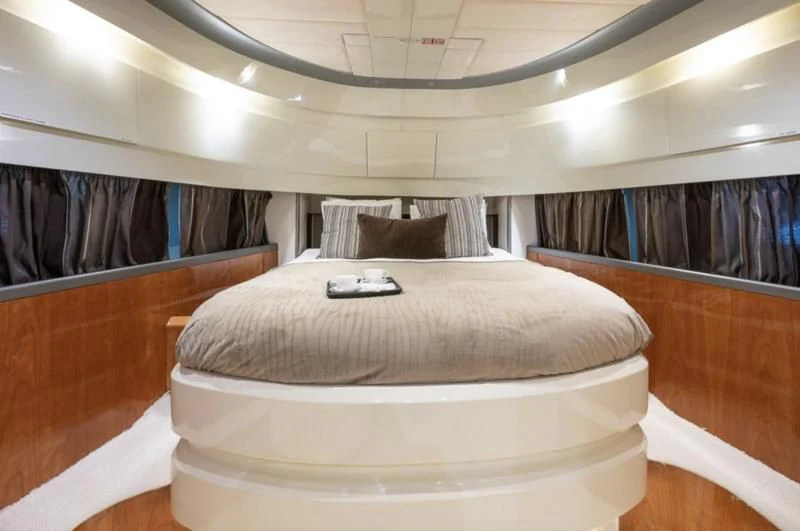 a bed in a room aboard WHITE FANG Yacht for Sale