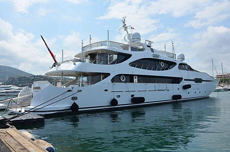 a large white yacht docked aboard JAMEEL Yacht for Sale