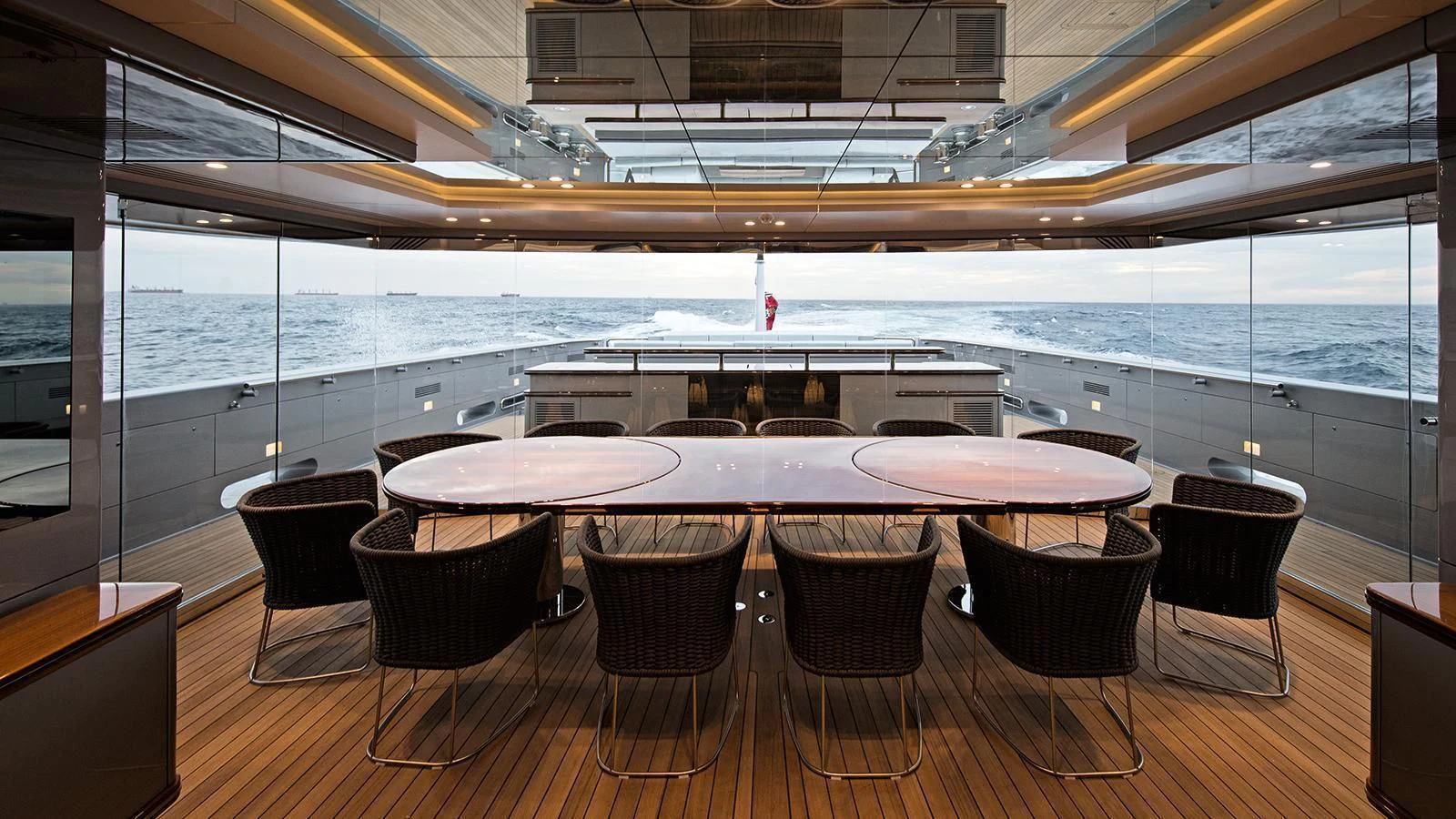 a restaurant with a table and chairs aboard SILVER FAST Yacht for Sale