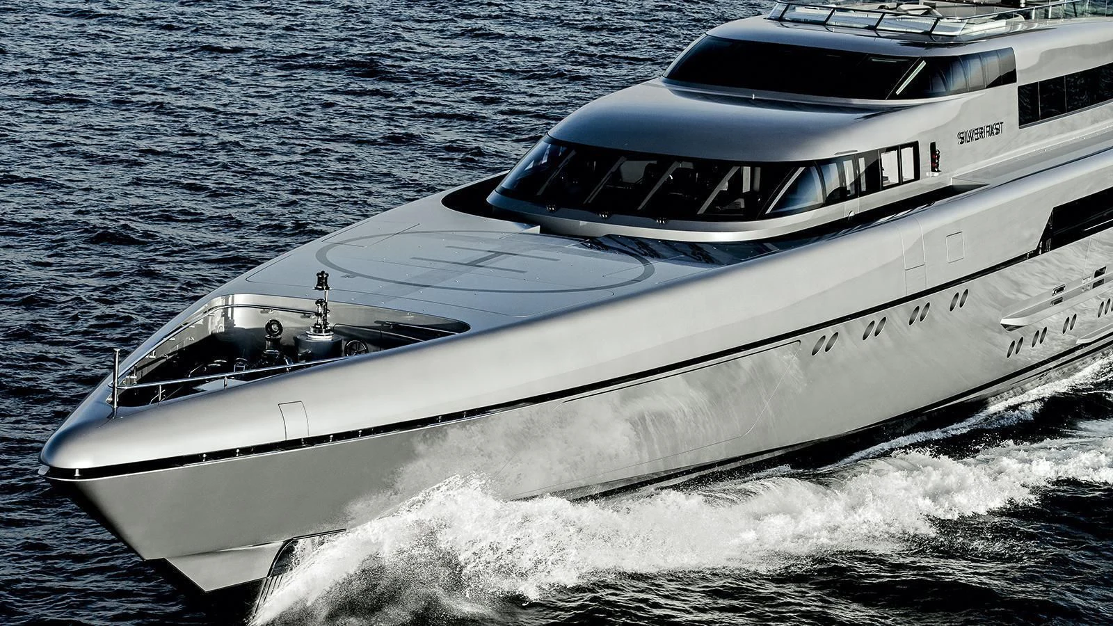 a white yacht on the water aboard SILVER FAST Yacht for Sale
