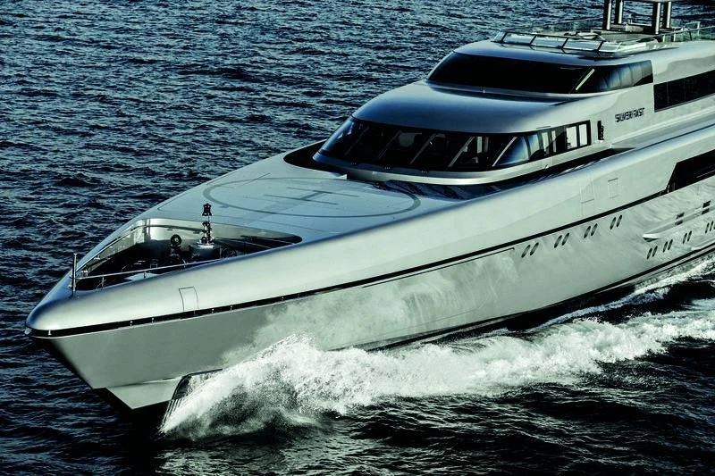 a white boat on the water aboard SILVER FAST Yacht for Sale