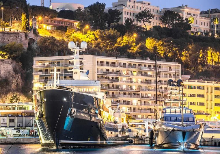 a large ship docked at a harbor aboard SILVER FAST Yacht for Sale