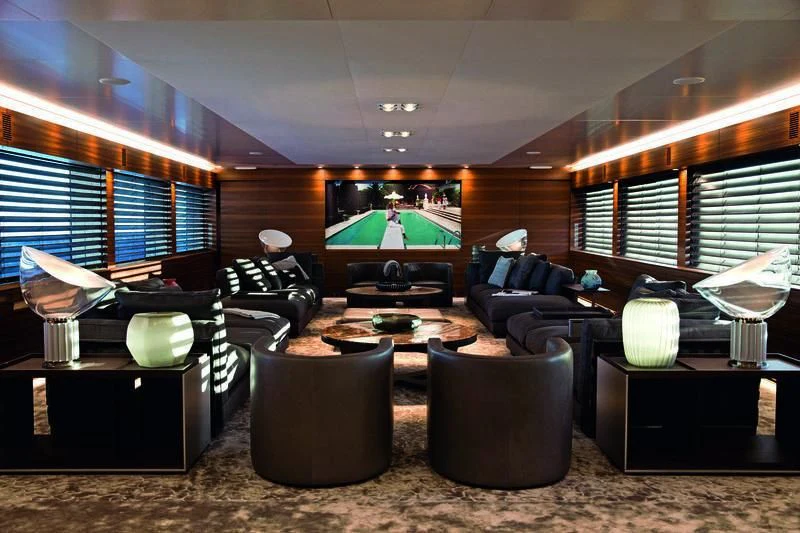 a living room with a large screen aboard SILVER FAST Yacht for Sale