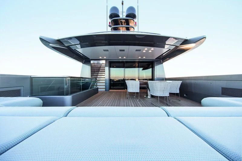 a large white and black boat with a person inside aboard SILVER FAST Yacht for Sale
