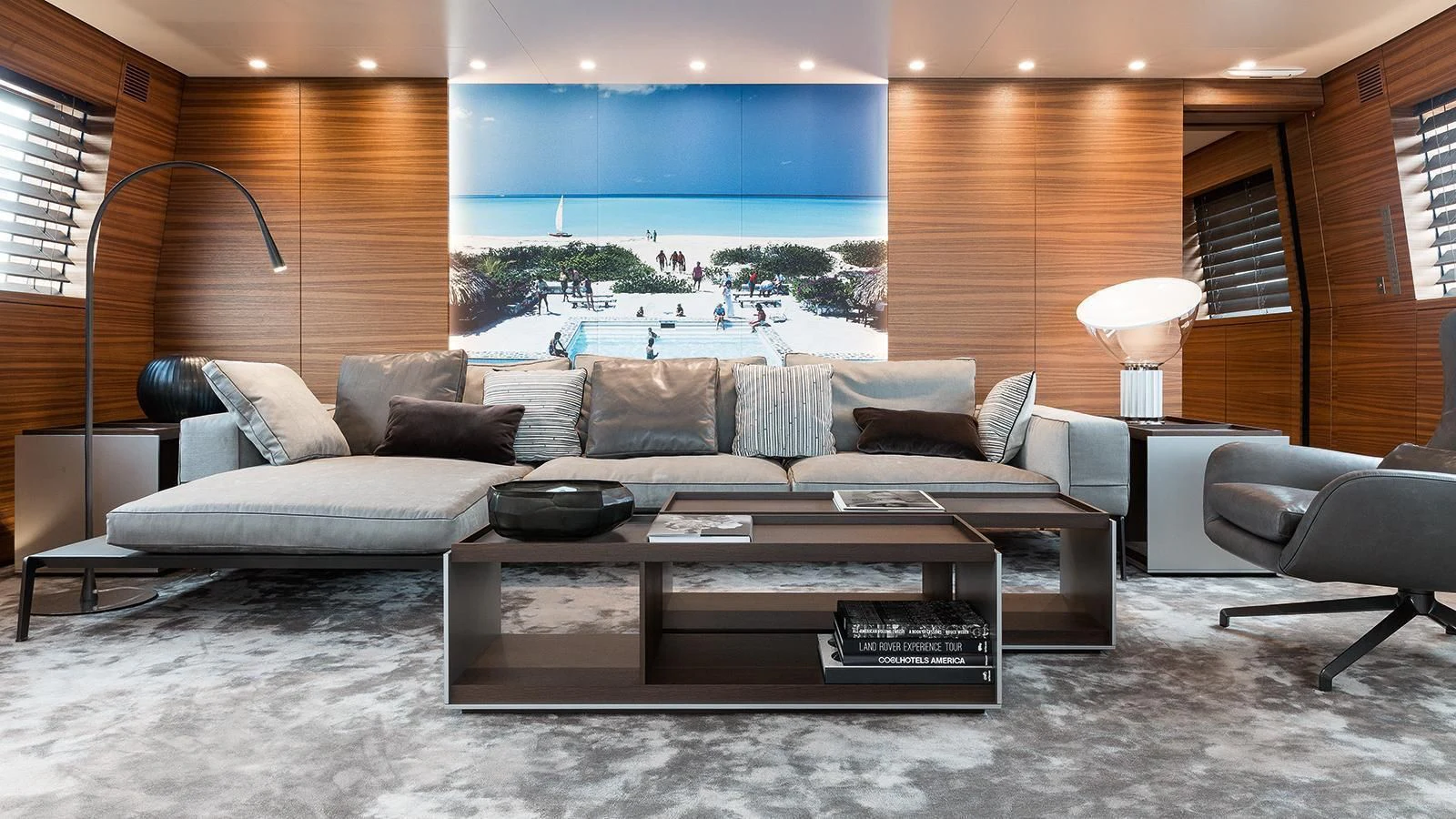 a living room with a large couch aboard SILVER FAST Yacht for Sale