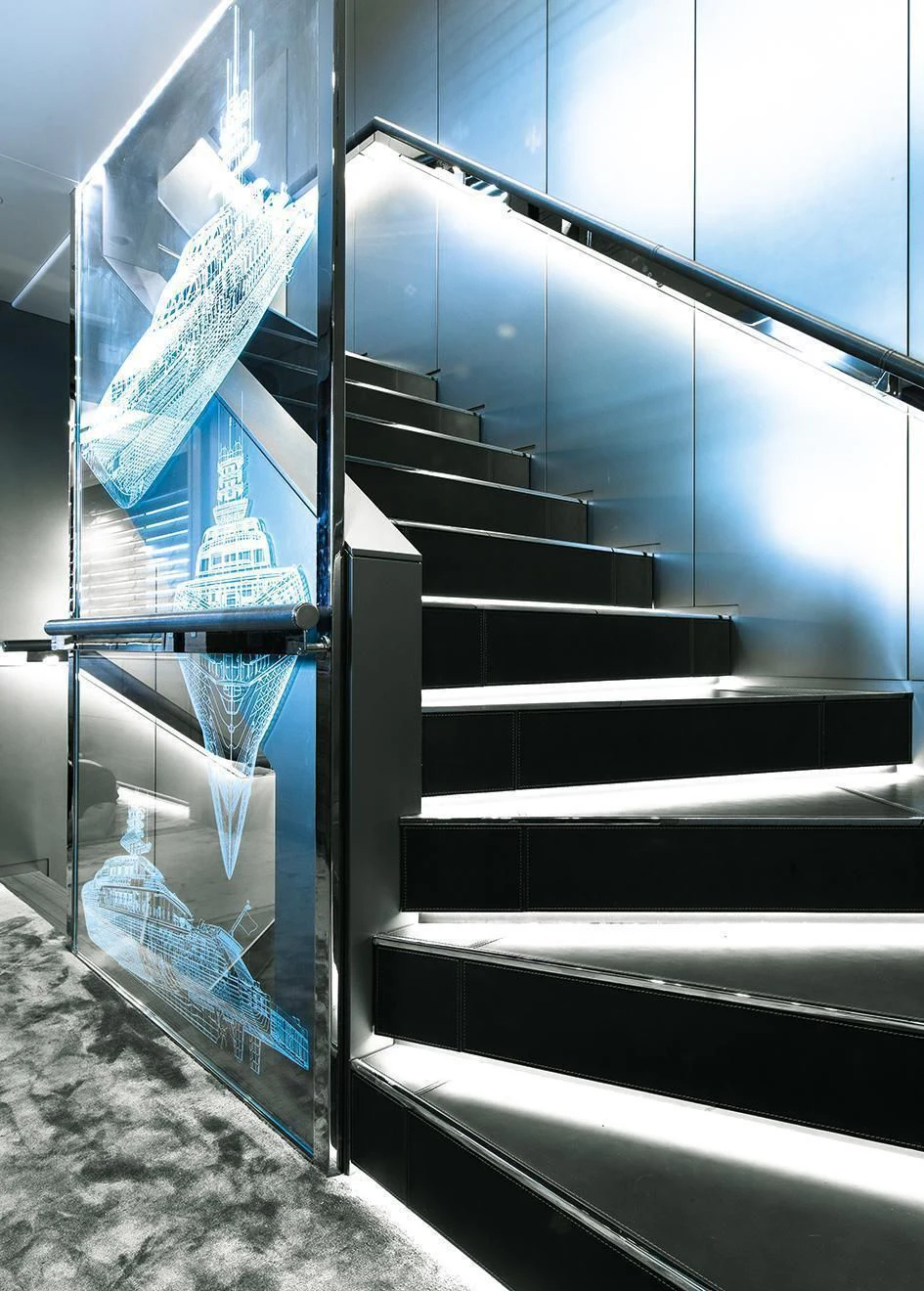 a black staircase with glass walls aboard SILVER FAST Yacht for Sale