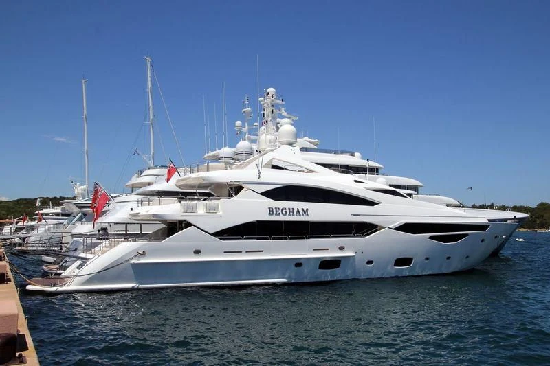 a white yacht on the water aboard BEGHAM Yacht for Sale