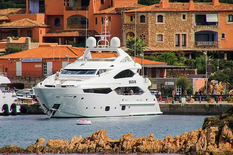 a white yacht in the water aboard BEGHAM Yacht for Sale