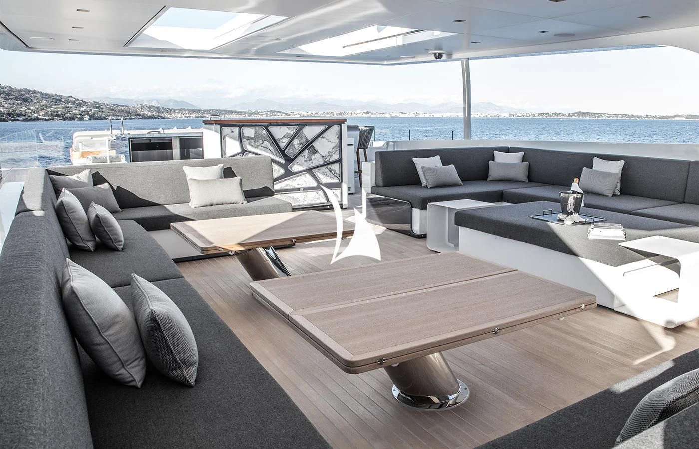 a living room with a large patio aboard SEVERIN°S Yacht for Charter