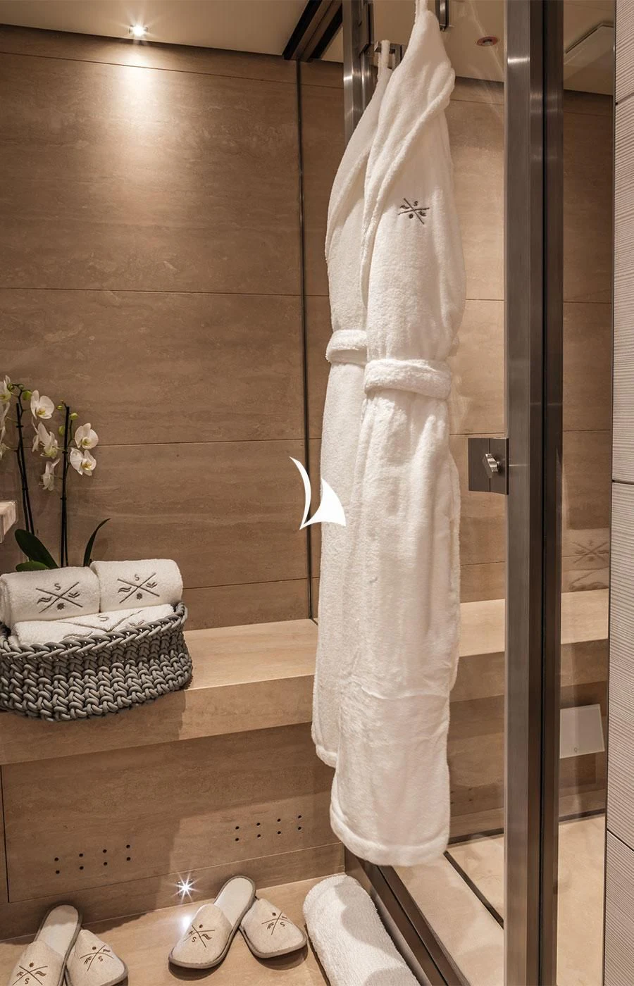 a white dress on a wall aboard SEVERIN°S Yacht for Charter